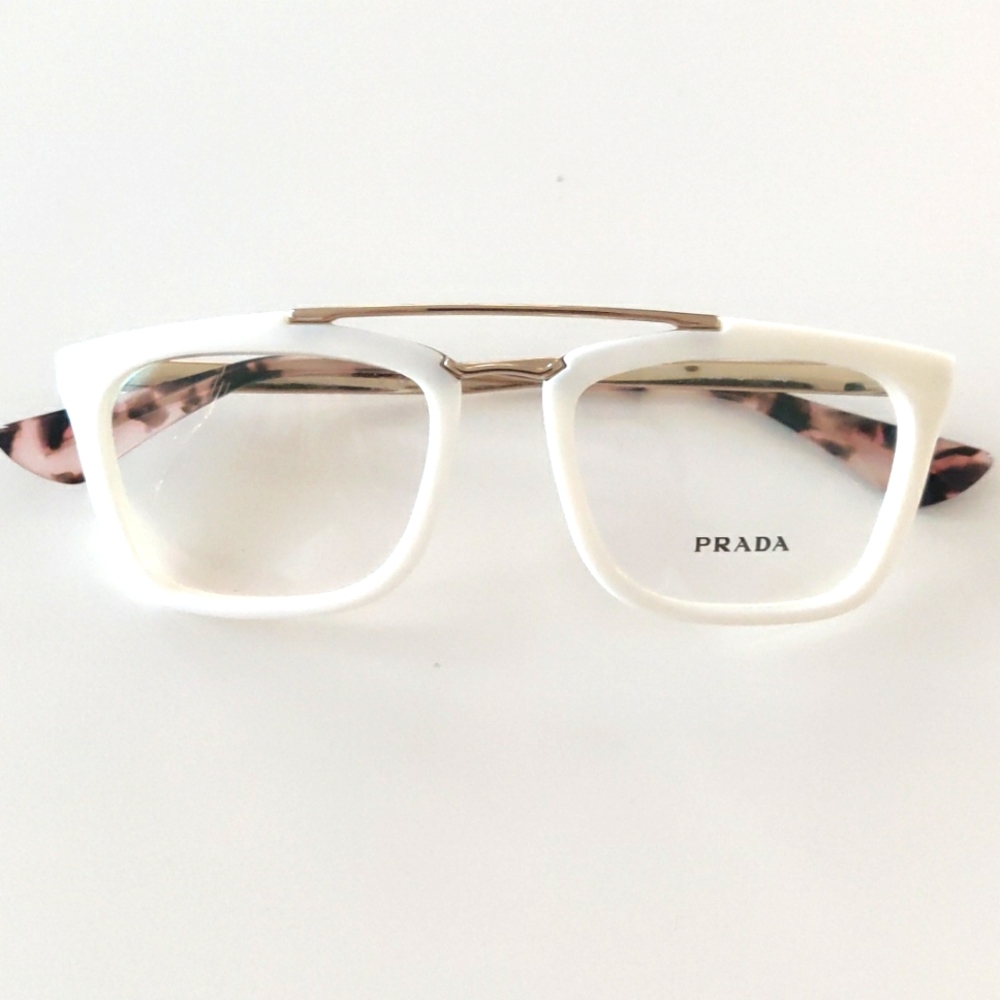 Prada 18QV Glasses. Ivory. 51-18-140